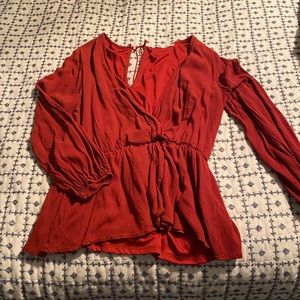 Burnt orange blouse. Perfect for fall!
